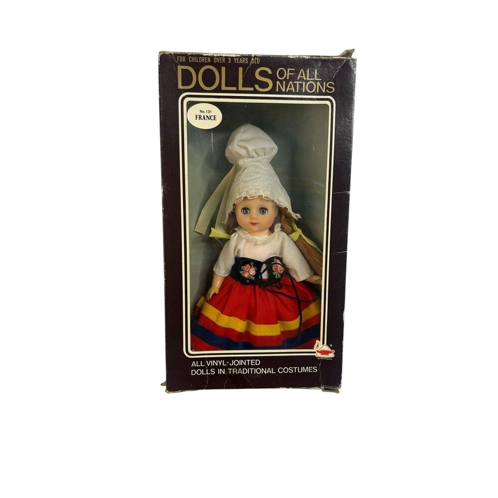 Dolls of All Nations Made 
in Hong Kong
 Movable eyes 7.5" France Doll